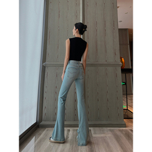 High end and exquisite elastic high waisted buttocks lifting micro flared jeans with a women's slit design for a sense of caution