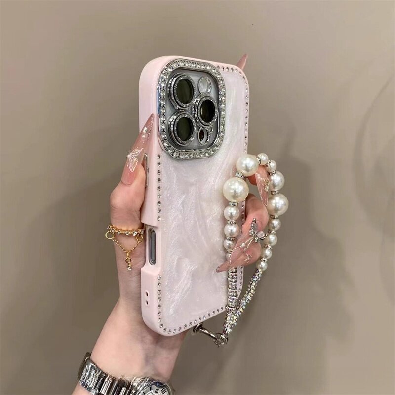 Super cute Instagram-worthy 17p cream-colored rhinestone Apple 16 Pro Max phone case with lanyard, suitable for iPhone 15 Pro protective case, new and popular 14pm high-end 13p trendy 12 women's full coverage drop protection case.