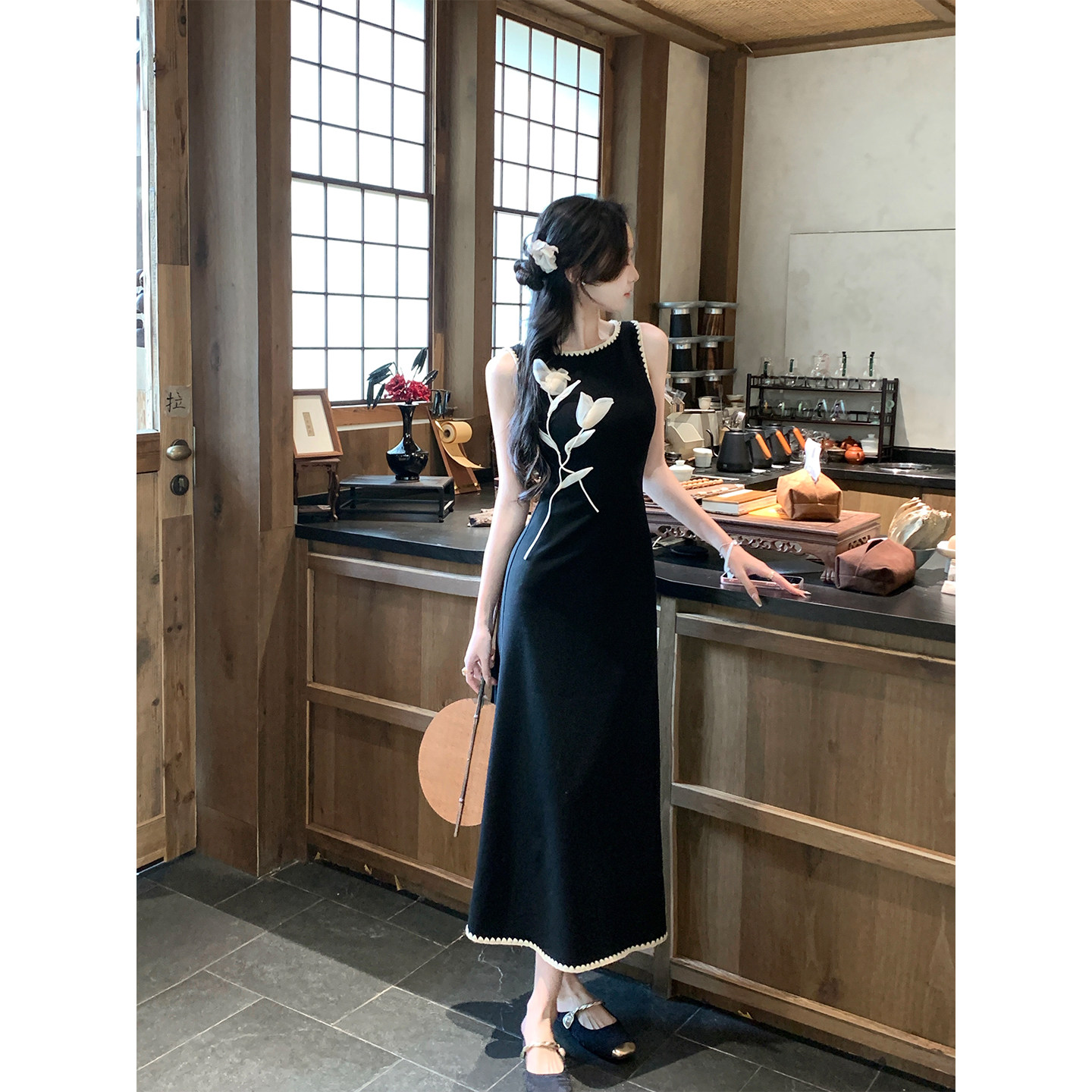 Korean Linxin Chinese style black sleeveless cheongsam dress with three-dimensional flowers, slim fit and beautiful fish tail long skirt