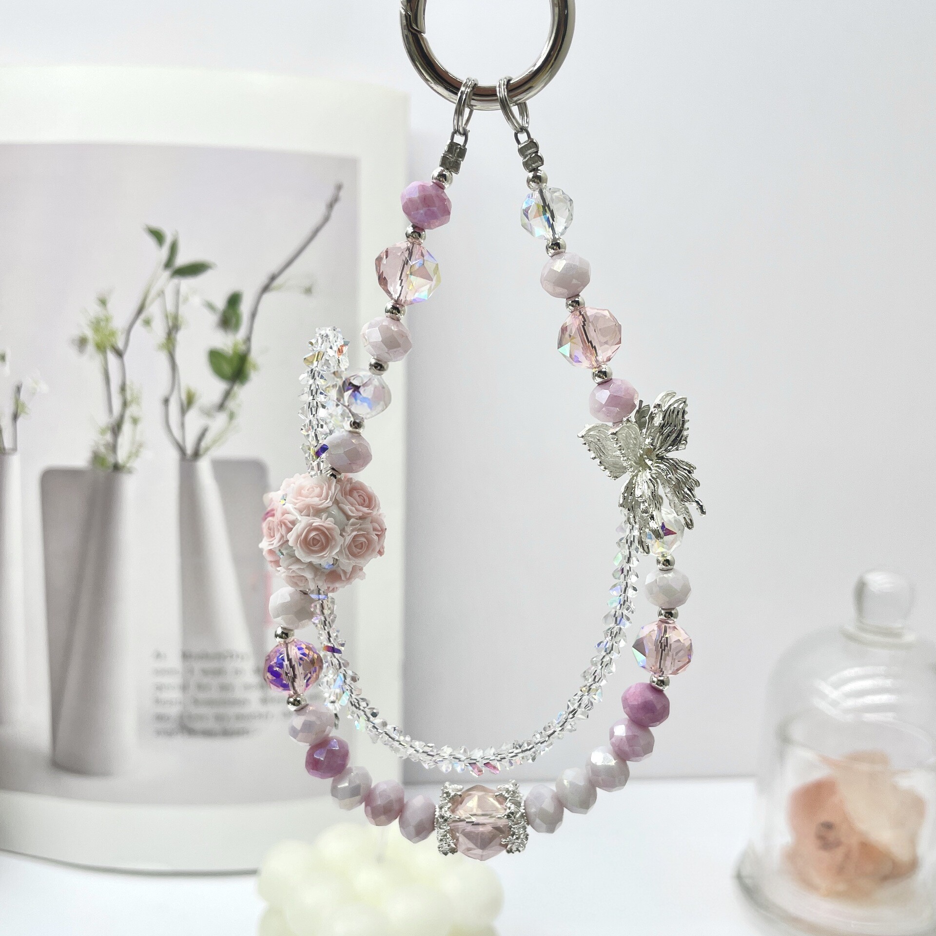 New original design alloy butterfly lily of the valley phone charm, super beautiful, light luxury, niche, exquisite and high-end women's handmade DIY crystal wrist strap bag key phone charm.