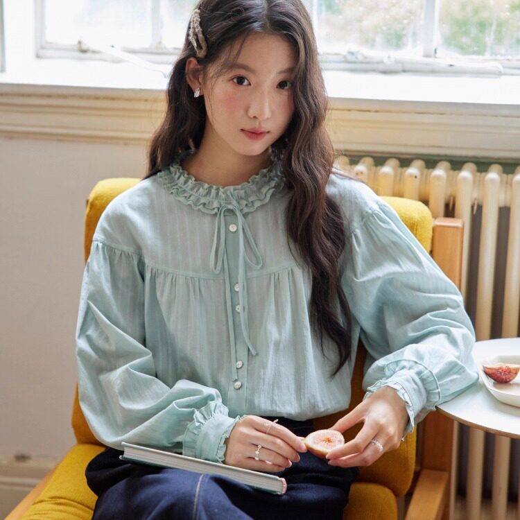 French retro style long-sleeved blouse with ruffled trim, new autumn/winter 2025 style, lace-trimmed stand collar, lotus green loose top.