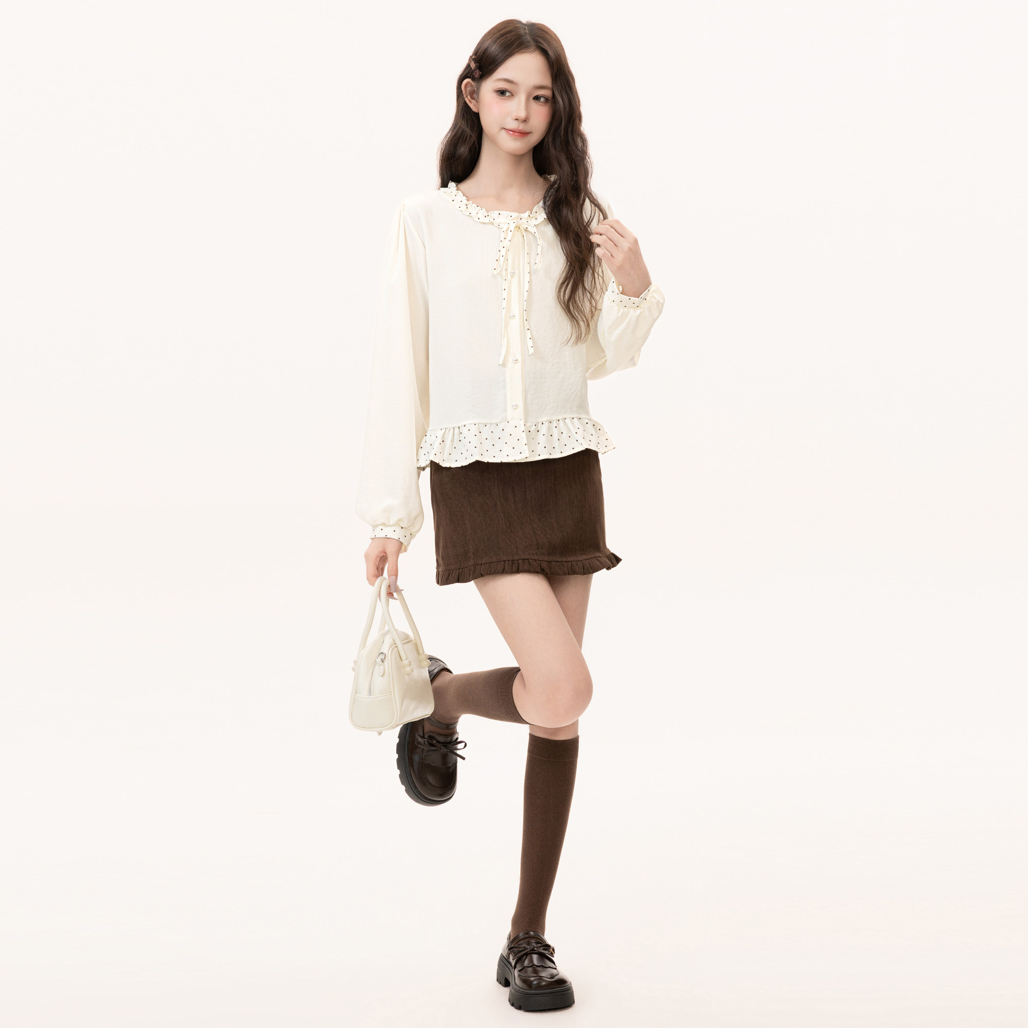 Apricot-colored, ruffled-trimmed, round-neck, long-sleeved blouse for women, 2026 spring and autumn new style, polka dot design, puff sleeves.