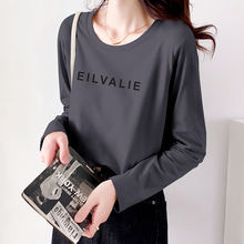 Long sleeved t-shirt for women in a nine year old store. Long sleeved t-shirt for women's inner wear in 2021. New pure cotton loose and fashionable gray bottomed shirt for spring and autumn