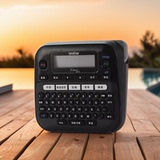 Этикетировочная машина Brother PT-D210/-E115B power - небольшой портативный бытовой принтер этикеток с сетевым кабелем