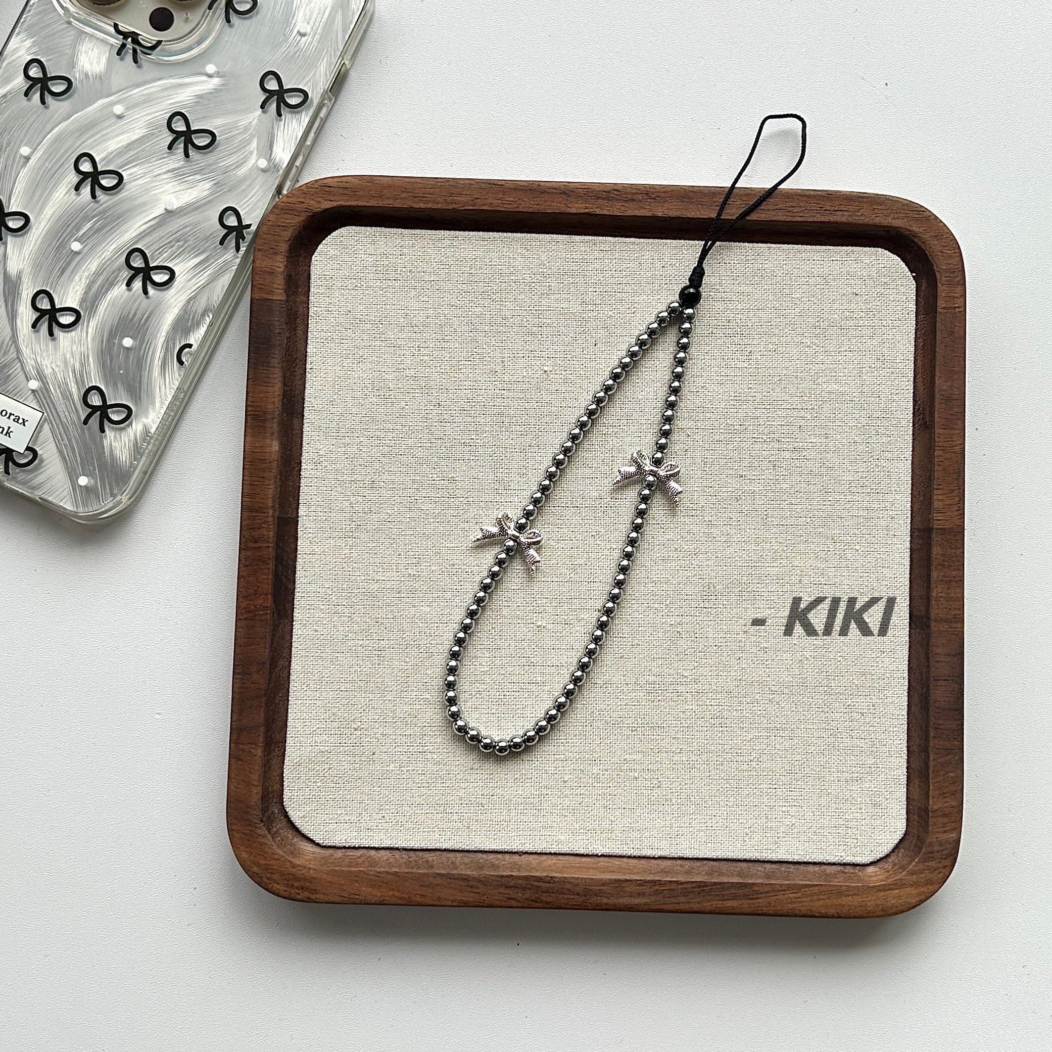 【KIKI】Cool and minimalist DIY Instagram-style phone chain lanyard with premium bow CCD pendant case. Original design.