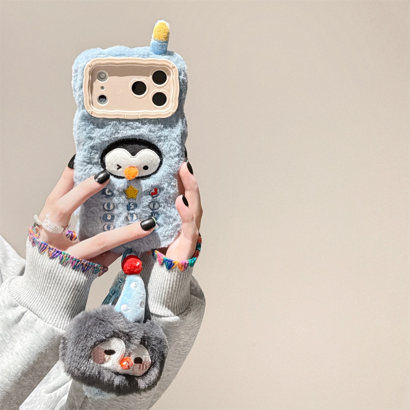 Blue plush penguin phone case for Apple iPhone 17 Pro Max and iPhone 16 Pro, plush lanyard for iPhone 14 Pro and 15 Pro, drop-proof and stylish.
