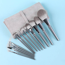 A new set of makeup brushes with 14 wooden handles, super soft beauty tools