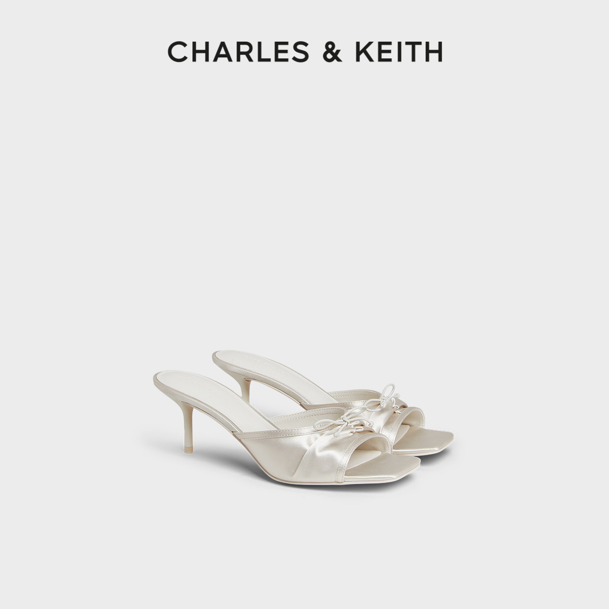 CHARLES&KEITH/ весенняя женская обувь; CK1-60280476; шлепанцы на шпильке с квадратным носком и бантом в складку; босоножки