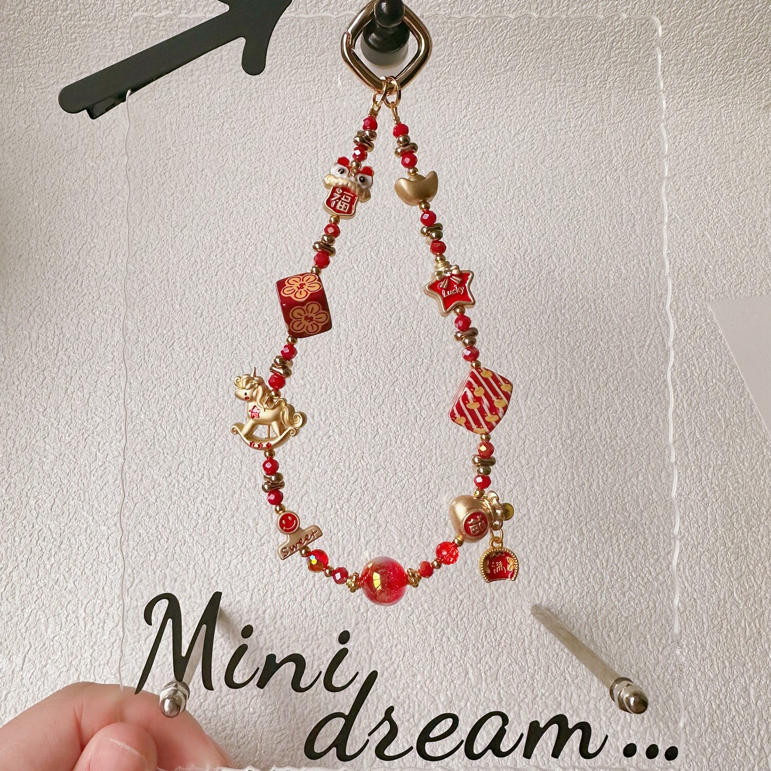 Original New Year design, featuring a lucky gold ingot alloy phone charm, auspicious and festive bag pendant, and a great gift.