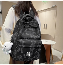 NY&NB backpack with large capacity, lightweight backpack for college students, minimalist travel bag for high school and junior high school students, backpack trend