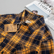 Spring and autumn long sleeved plaid shirt for casual commuting