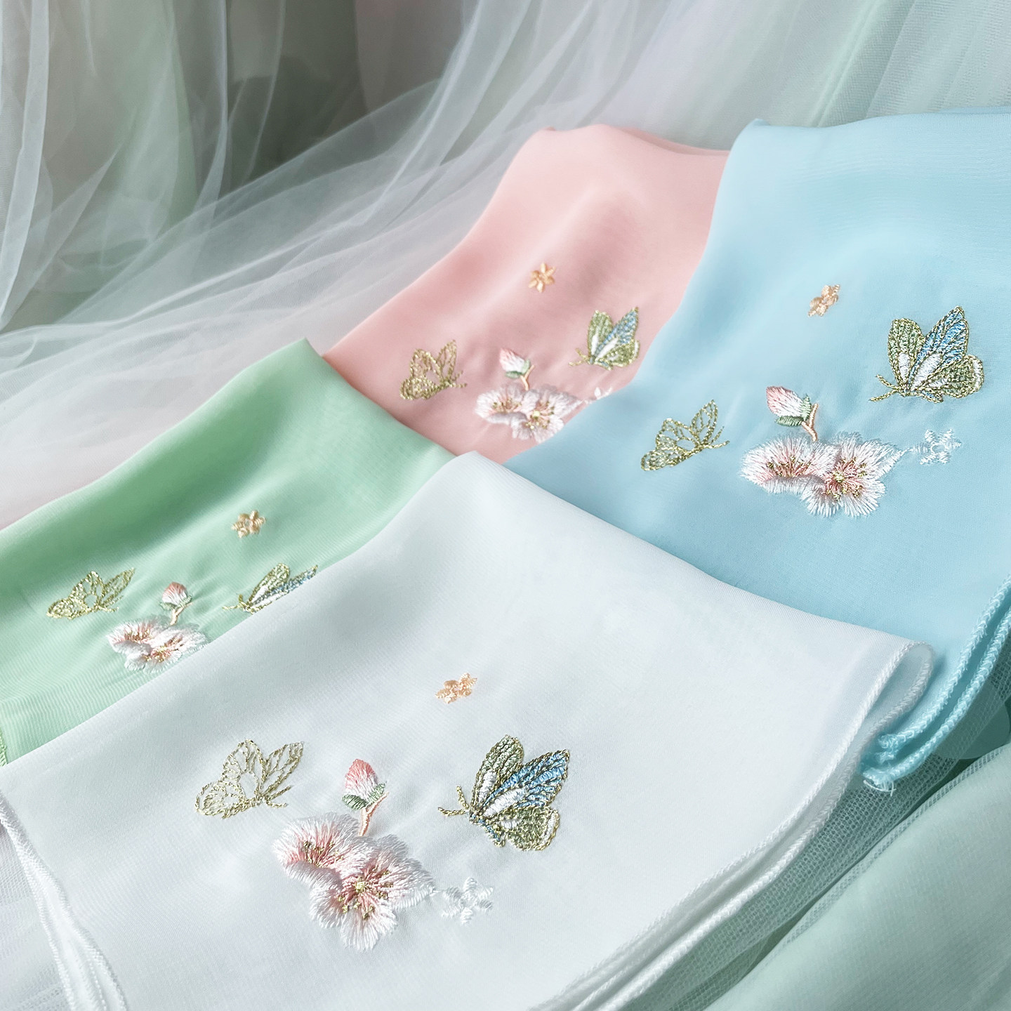 The original costume dance performance props from the group are embroidered with flowing butterflies and flowers...