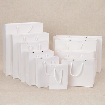 White card film coated paper bag clothing packaging handbag in stock gift bag printing gift shopping bag logo hand carry