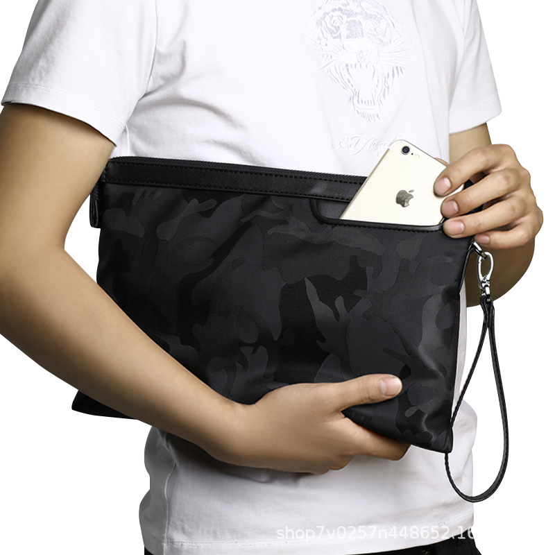 Factory direct supply cross-border men's handbag men's bag zipper wallet envelope Oxford cloth leisure wrist bag one generation