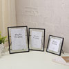 Wholesale desktop ornaments square mini photo frame 5678 inch transparent glass metal bracket photo frame table