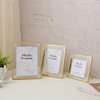 Wholesale desktop ornaments square mini photo frame 5678 inch transparent glass metal bracket photo frame table