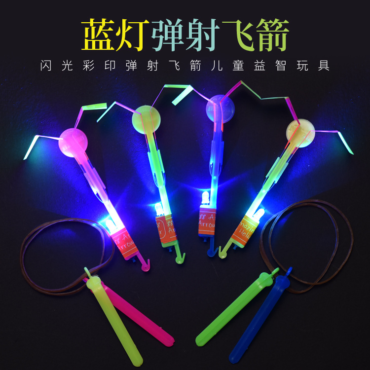 Street stall selling LED light-emitting small flying arrows...