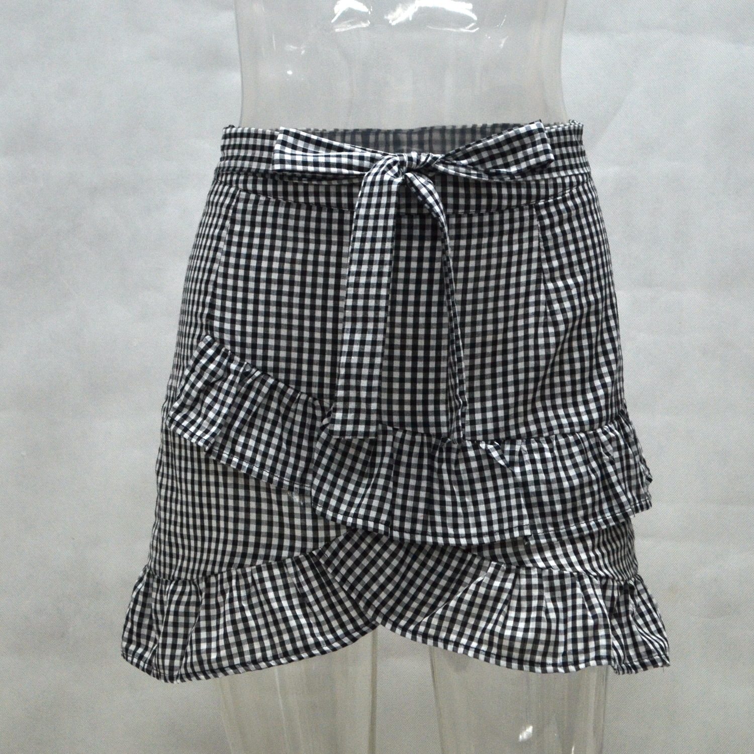 Plaid Patchwork Mini Skirt Ruffled Hem Cross Back Design Sexy Style Perfect for Parties and Casual Outings