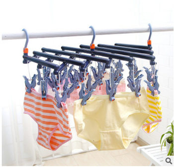 Second collection drying rack windproof multi-head foldable telescopic multifunctional plastic creative 29 clip roller Hong Kong and Taiwan