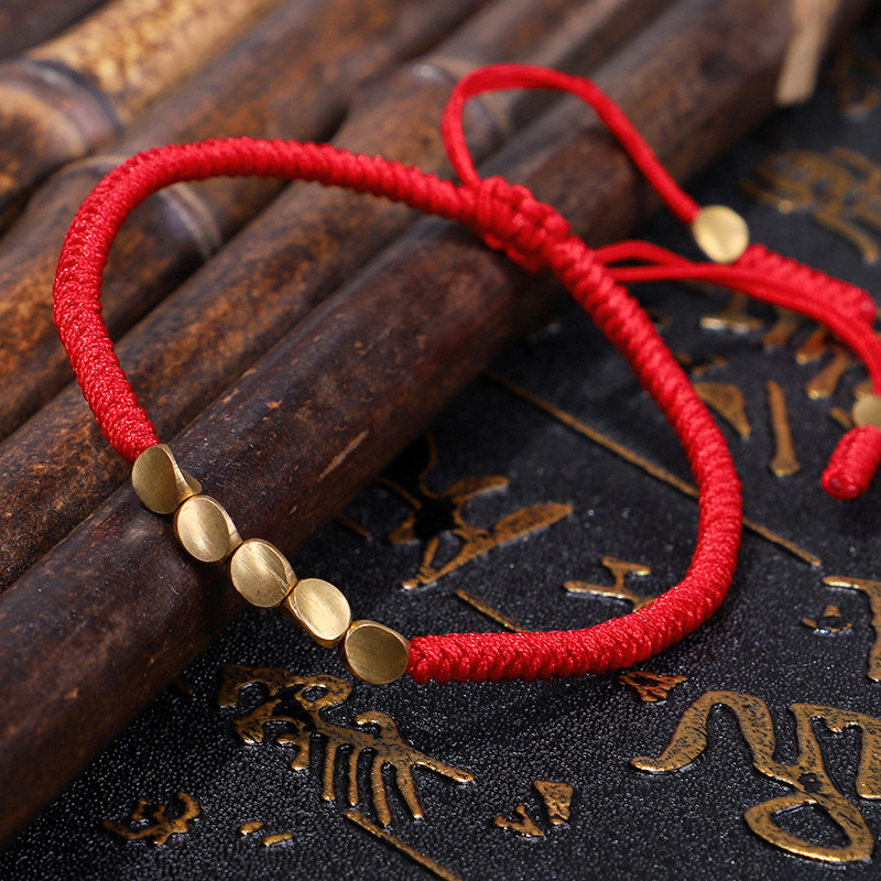 Amazon new jewelry hand-woven Diamond Knot bracelet Xizang creative shaped copper beads red hand rope