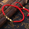 Amazon new jewelry hand-woven Diamond Knot bracelet Xizang creative shaped copper beads red hand rope