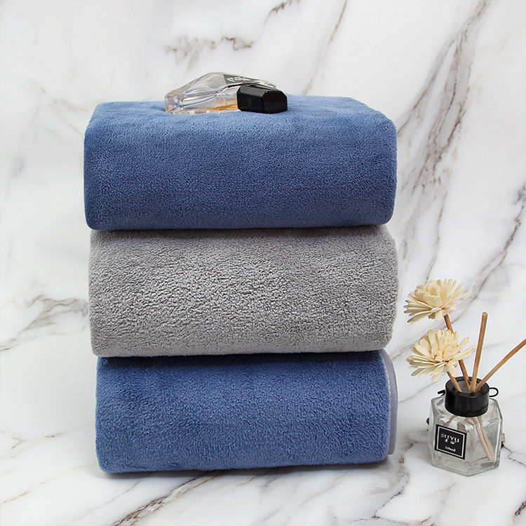 Factory wholesale 90*160 extra large thick coral fleece absorbent household large bath towel can be worn wrap towel towel can be sent on behalf