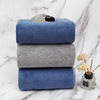 Factory wholesale 90*160 extra large thick coral fleece absorbent household large bath towel can be worn wrap towel towel can be sent on behalf