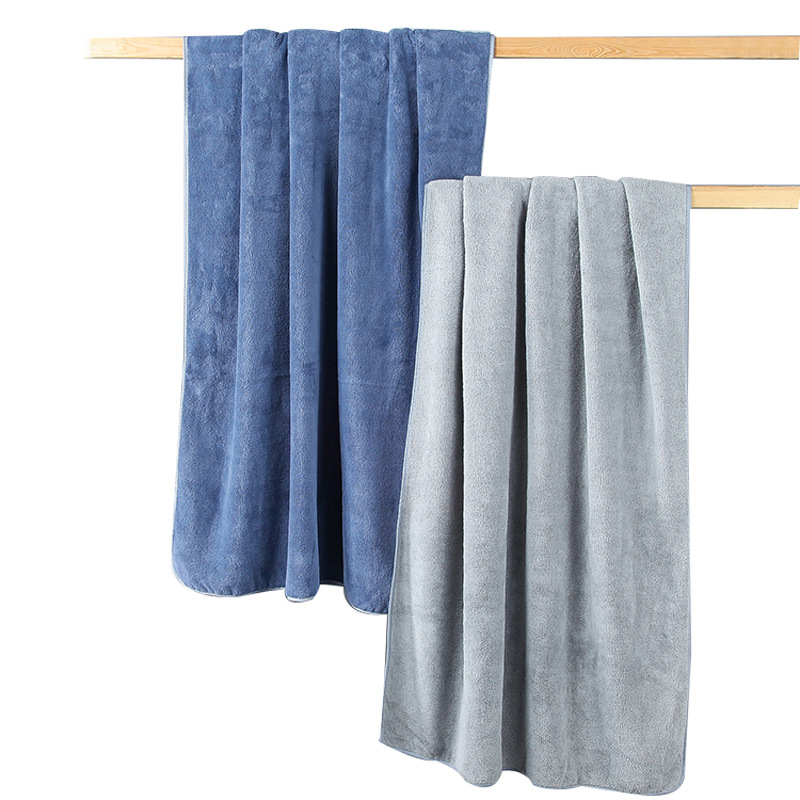 Factory wholesale 90*160 extra large thick coral fleece absorbent household large bath towel can be worn wrap towel towel can be sent on behalf
