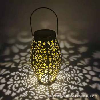 Cross-border new solar lamp hollow portable Iron Lantern round projection portable lamp outdoor courtyard landscape lamp