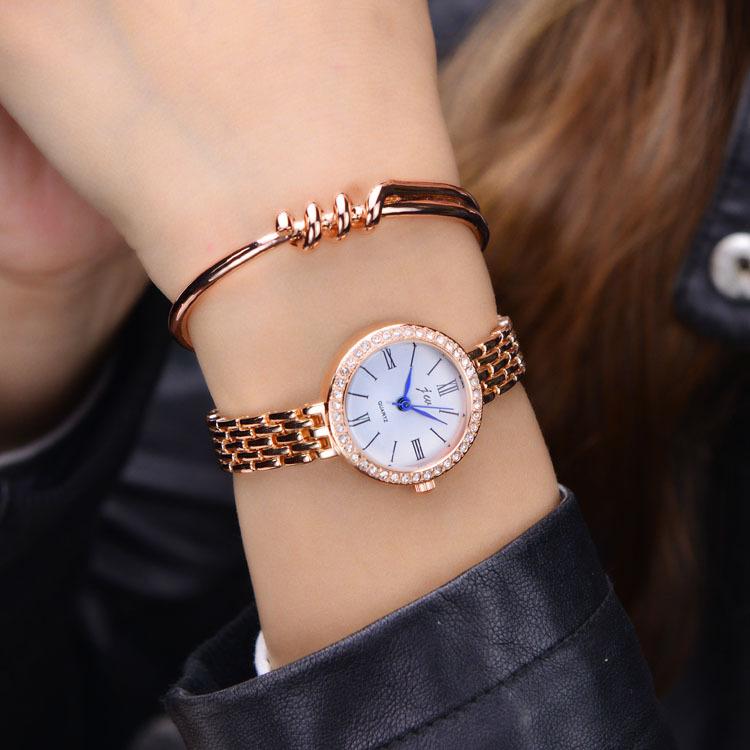 电视同款女表韩版时尚罗马条钉女士腕表玫瑰金色学生环钻手链表