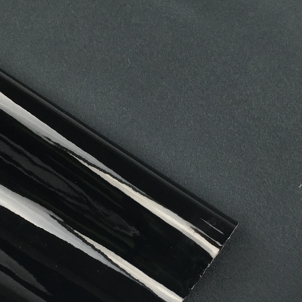 Manufacturers supply pu leather mirror leather imitation cotton velvet bottom leather crease-free black mirror in stock a generation of hair