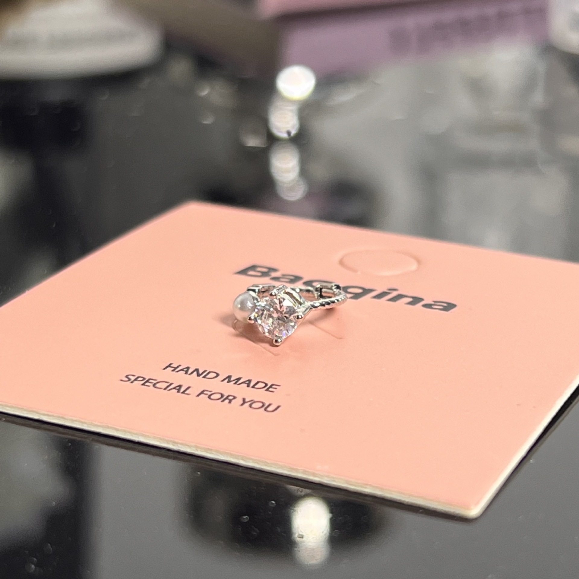 シルバー973 ホワイトジルコニウム イヤーボーンバックル（シングル）