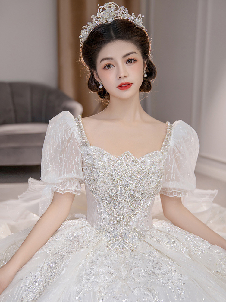 Wedding Female 2022New Bride Main Yarn Word Shoulder Temperament Palace Wind Heavy Drag Tail Spring Puff Formal dress  婚纱女2022新款新娘主纱一字肩气质宫廷风重工拖尾春季泡泡袖礼服 Wedding Female 2022New Bride Main Yarn Word Shoulder Temperament Palace Wind Heavy Drag Tail Spring Puff Formal dress 