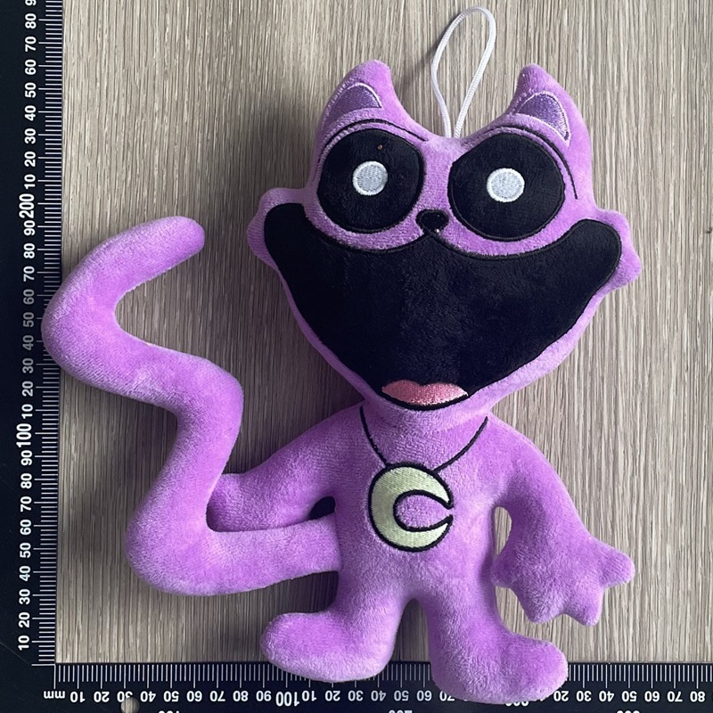 跨境恐怖微笑紫猫毛绒玩具公仔 趴姿大嘴猫smiling critters toy