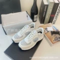 Gray and white embellishment
