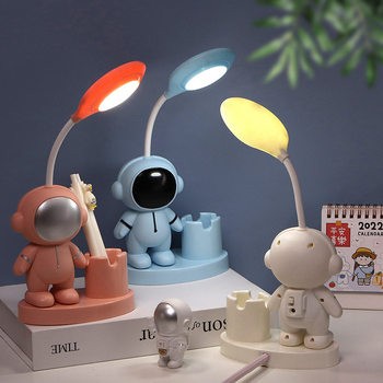 Creative astronaut night light LED multi-function pen holder usb learning charging eye lamp wholesale bedside lamp