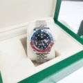 Four-pin coke circle, five-bead silver strap, red and blue circle, black face