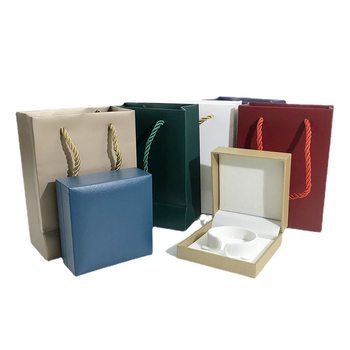 Source factory jewelry handbag embossed three-strand rope coated paper gift bag spot wholesale plus logo printing