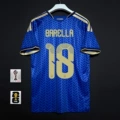 Italy home jersey, number 18 with captain's armband