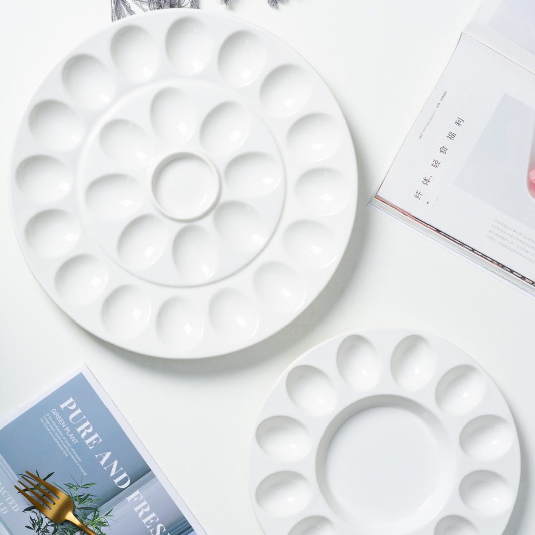 French-style ceramic baking screw plate microwave oven Amazon creative 19-grid egg doll baking plate snail baking plate Christmas ceramic