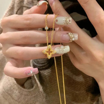 Gold Brushed Four-Leaf Clover Starburst Necklace for Women Ins Flash Diamond Niche Design High-End Accessible Luxury Clavicle Chain Wholesale