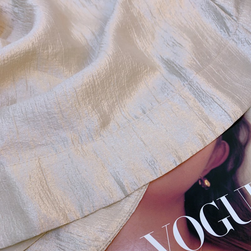 Chân váy chữ A midi vải Tencel phối ly xòe màu be nhạt — Màu be nhạt