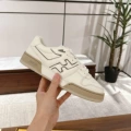 White leather and gray characters