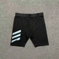Half length pants black belt-colored three poles