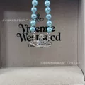Blue saturn pearl necklace