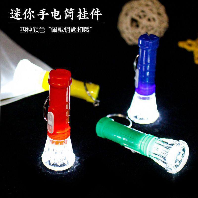 Household Small Flashlight Transparent Head Mini Small Flashlight Street Stall Hot Selling Plastic Button Battery Flashlight Keychain