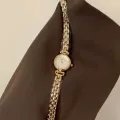 Gold with white surface
