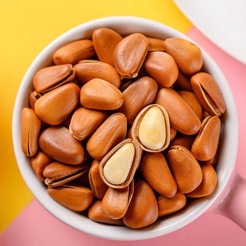 Herbal flavor Northeast Pine nuts 100G open hand-peeled pine nuts full particles casual snacks nuts specialty
