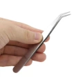 Sticker tool-tweezers