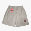 Gray pants, red tag